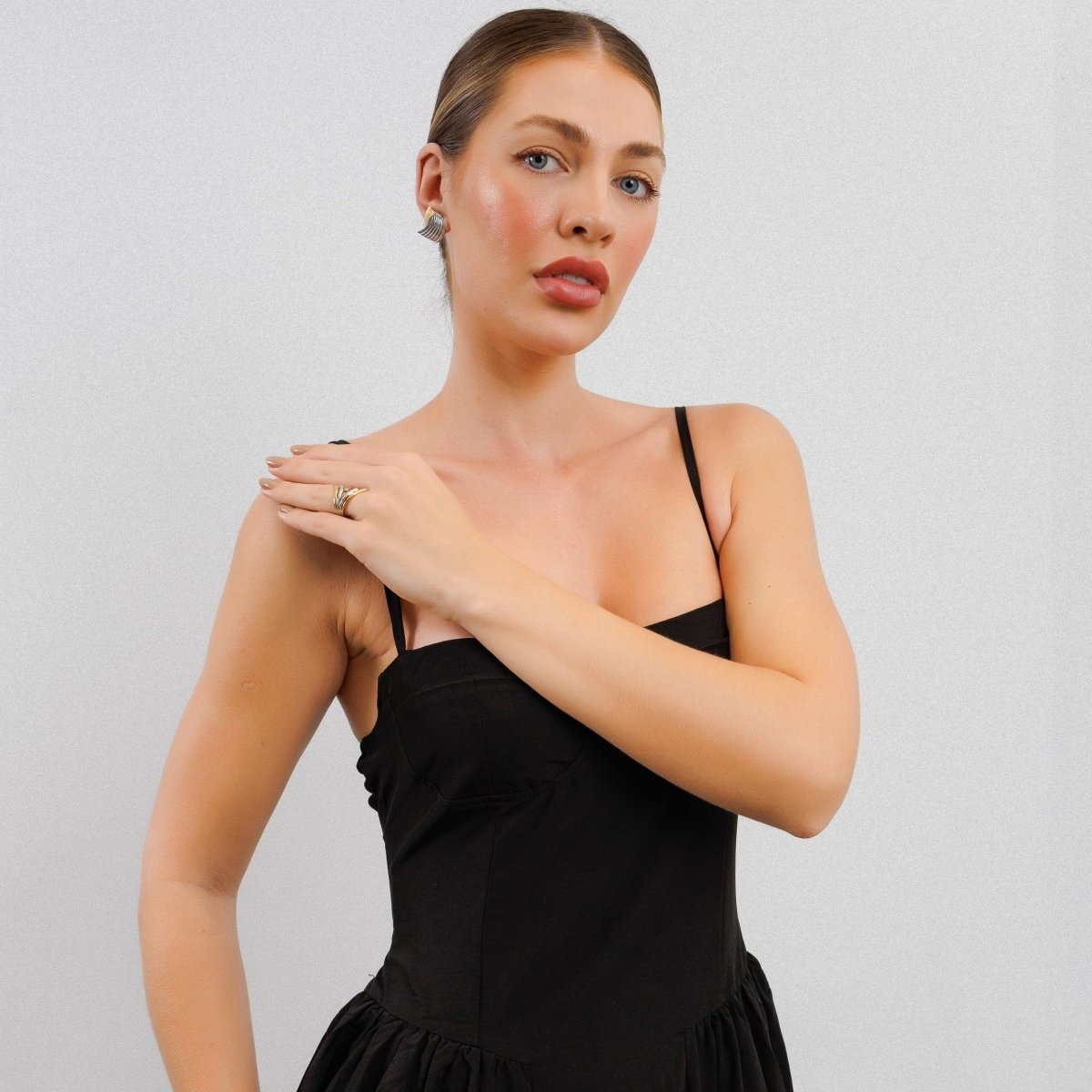 Anillo de flujo ajustable con baño mixto de oro y plata