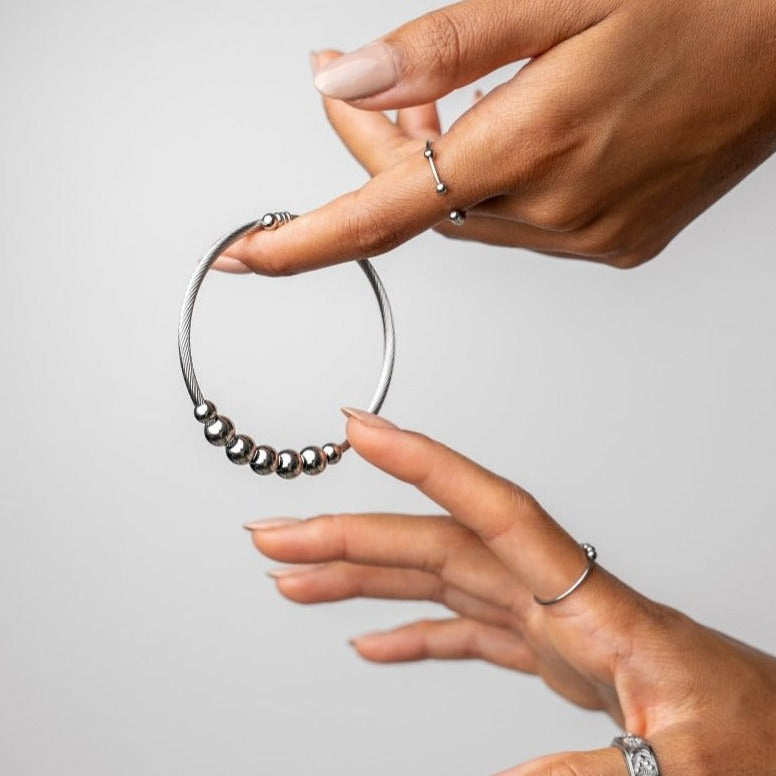 Pulsera ajustable antiestrés - Plata