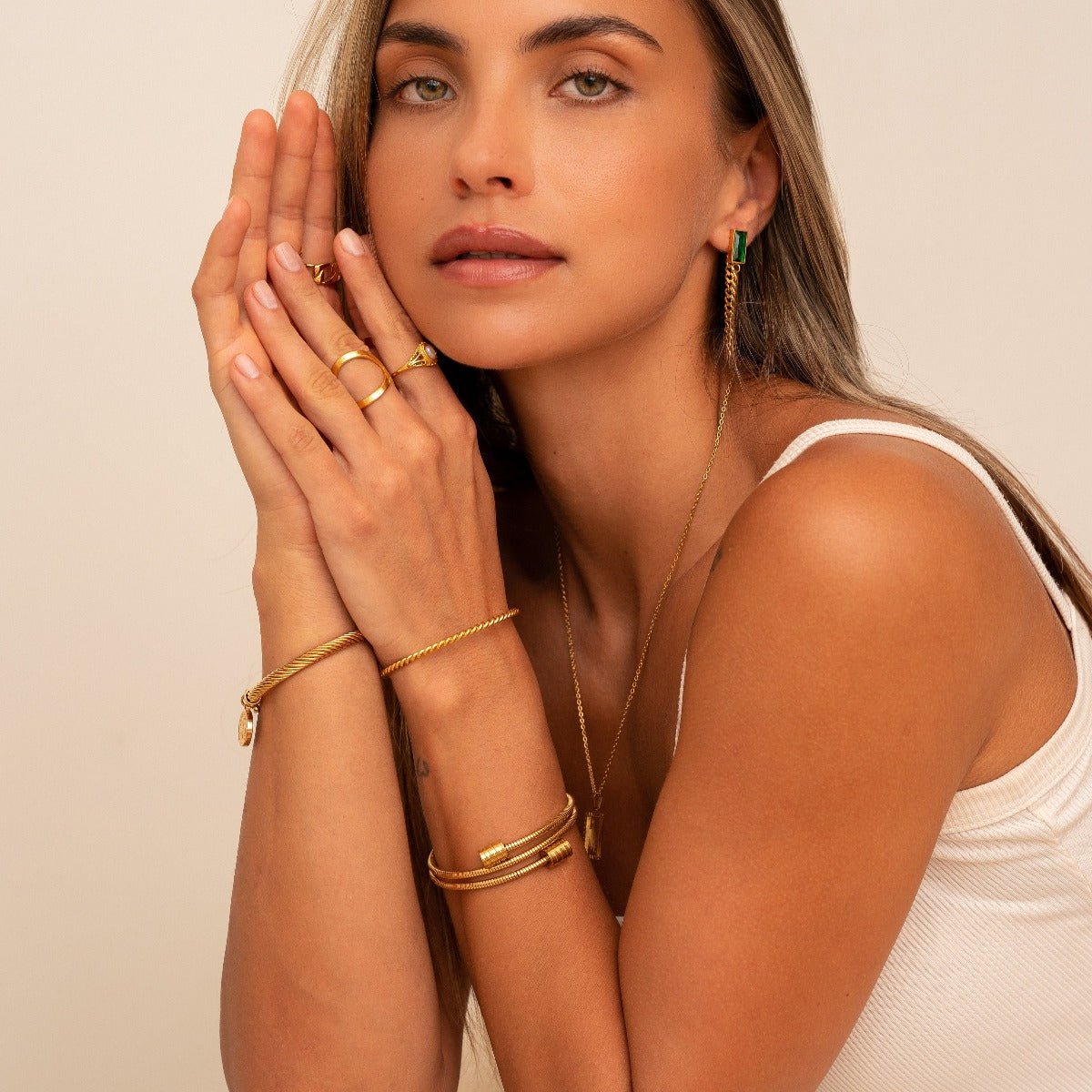 Pulsera Twist bañada en oro de 18 quilates