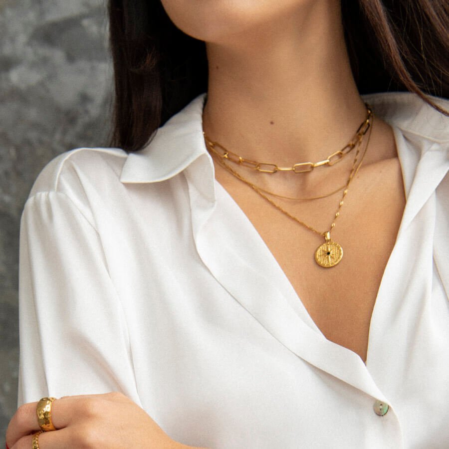 Collar con estrella y brújula rosa bañado en oro de 18 quilates