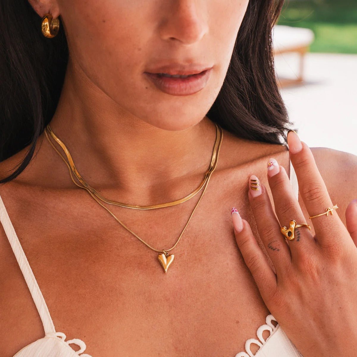 Collar de corazón tallado mixto bañado en oro de 18 quilates